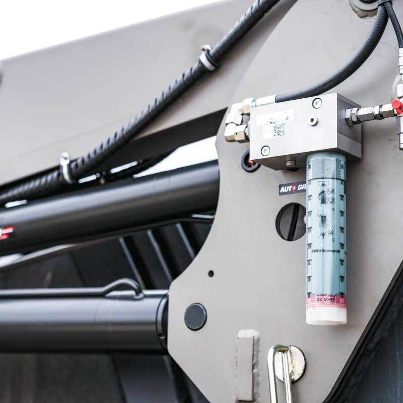 Lubrificazione automatica AUTO-GREASE per il caricatore TX400
