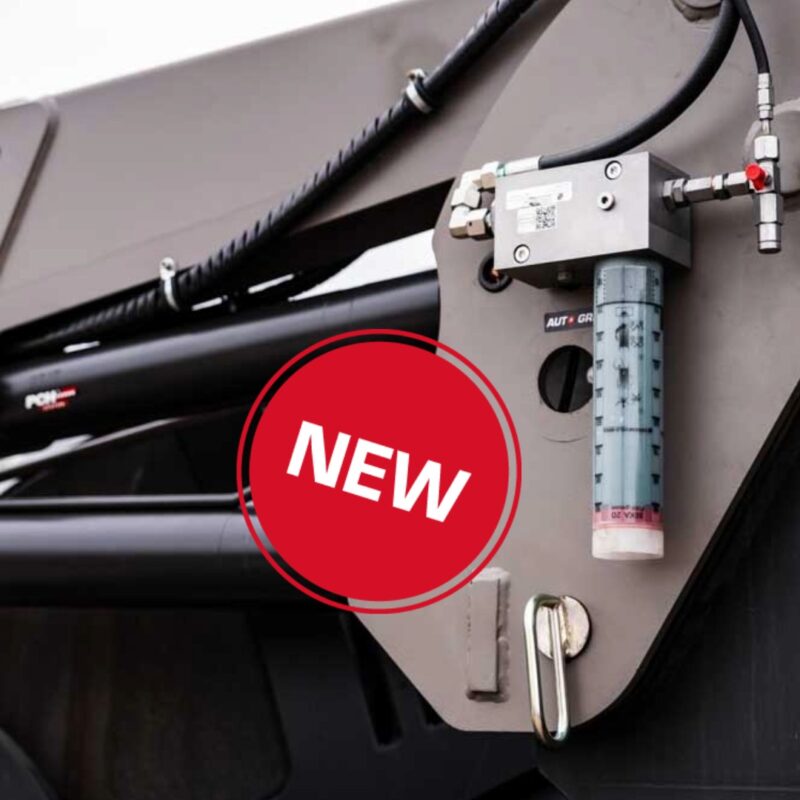 Graissage automatique AUTO-GREASE pour le chargeur TX400